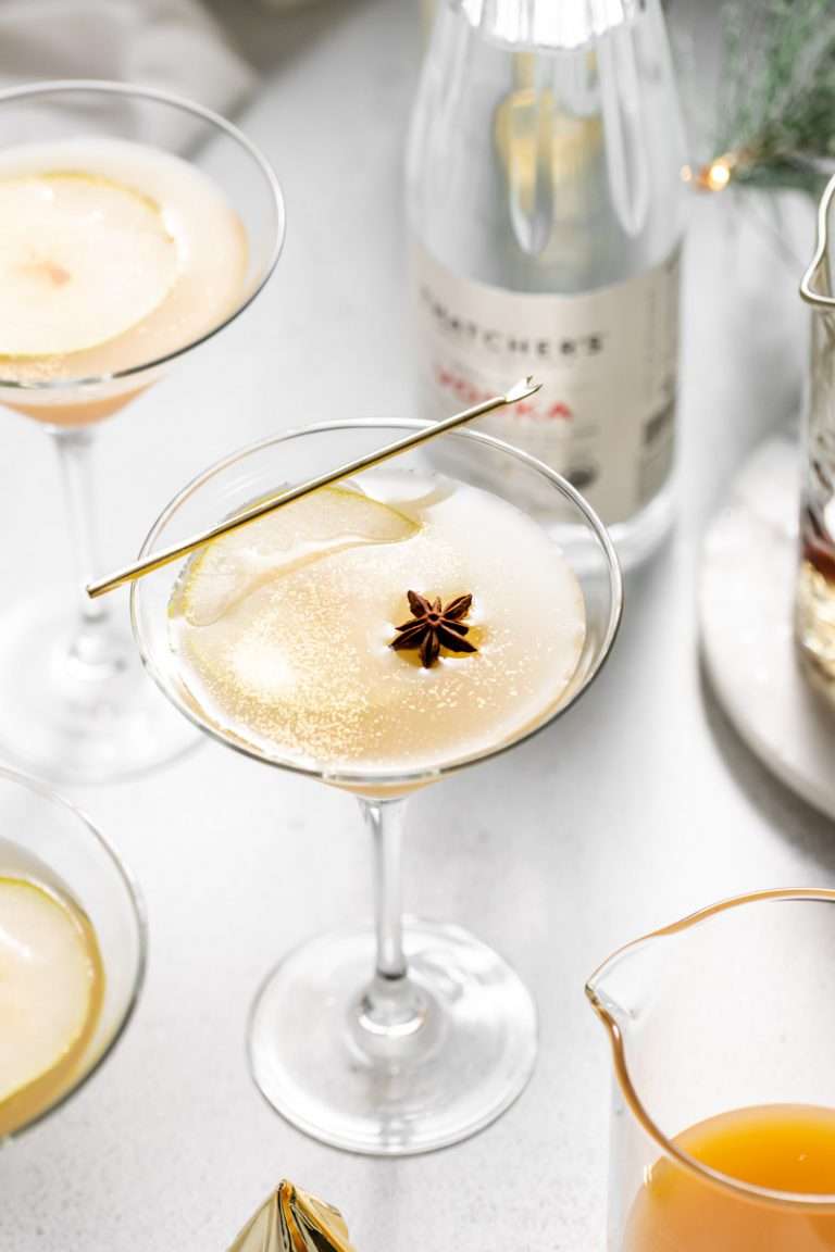 Spiced Pear Martini for the holiday season - Made with Thatcher's Organic Vodka, pear juice, elderflower and spiced simple syrup.