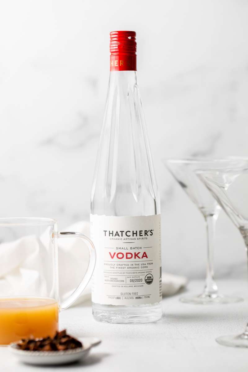 Spiced Pear Martini for the holiday season - Made with Thatcher's Organic Vodka, pear juice, elderflower and spiced simple syrup.