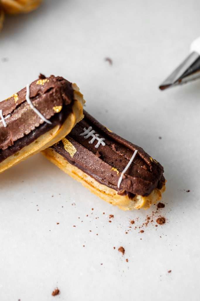 How to make chocolate peanut butter football eclairs for Super Bowl Sunday. Dairy Free Recipe