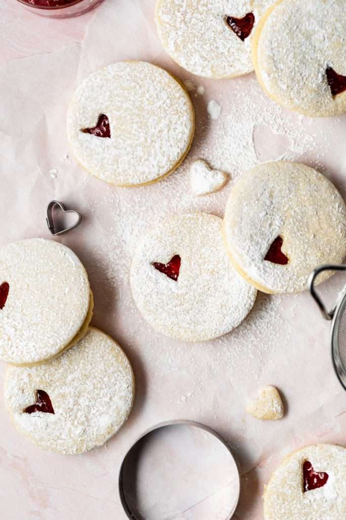 Easy dairy free linzer cookies filled with strawberry jam. Try the recipe for any holiday!