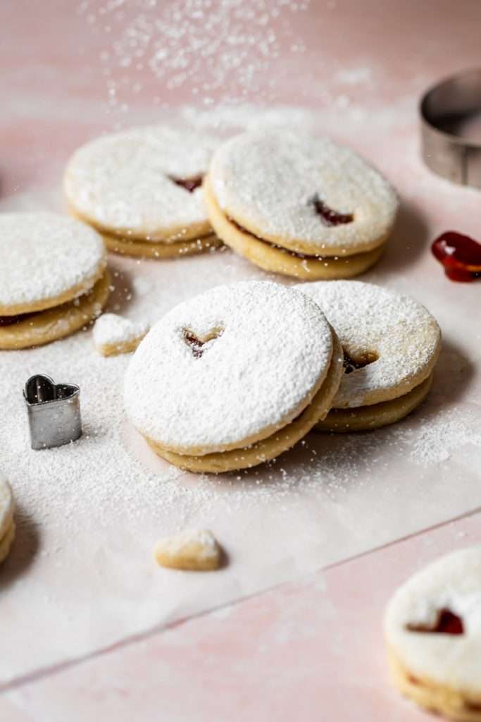 Easy dairy free linzer cookies filled with strawberry jam. Try the recipe for any holiday!