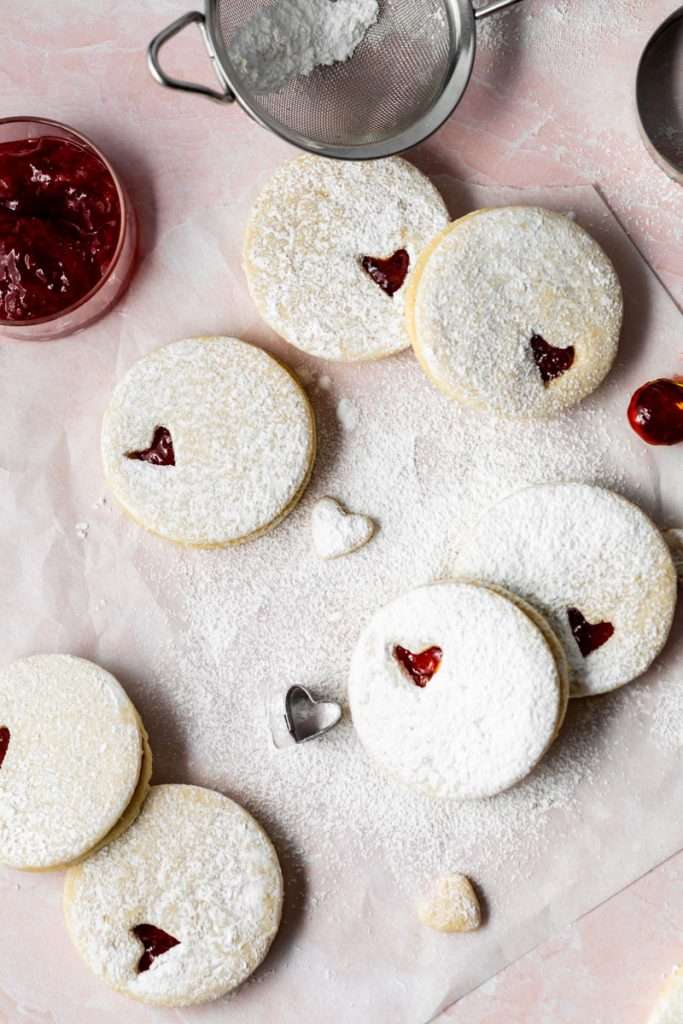 Easy dairy free linzer cookies filled with strawberry jam. Try the recipe for any holiday!
