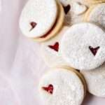 Easy dairy free linzer cookies filled with strawberry jam. Try the recipe for any holiday!