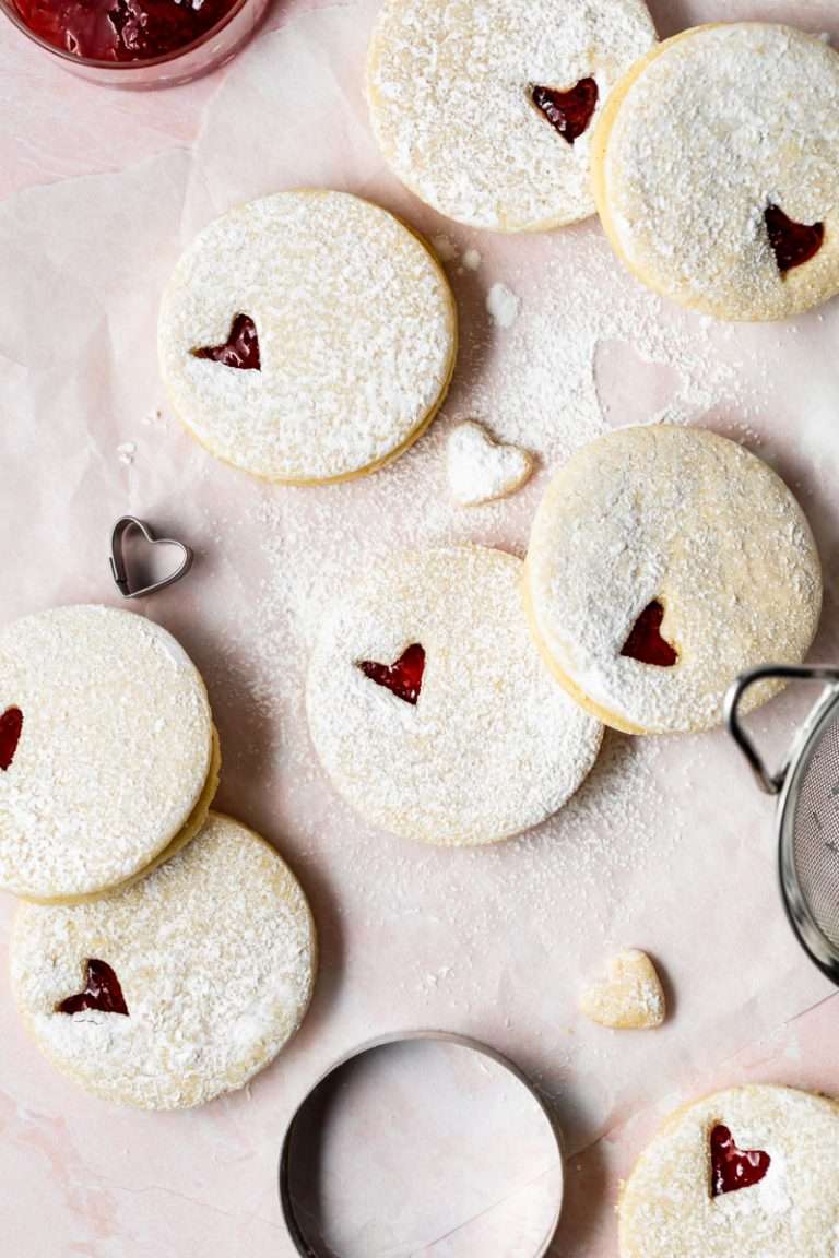 Easy dairy free linzer cookies filled with strawberry jam. Try the recipe for any holiday!