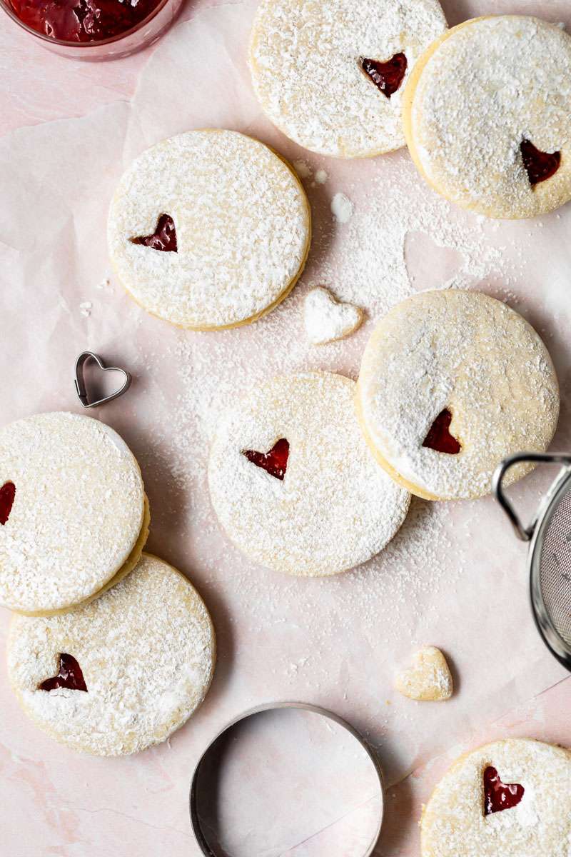 Easy dairy free linzer cookies filled with strawberry jam. Try the recipe for any holiday!