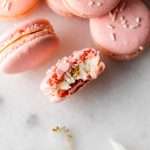 how to make birthday cake French macarons, filled with rainbow sprinkle frosting and rainbow cake crumbs. Dairy free & gluten free