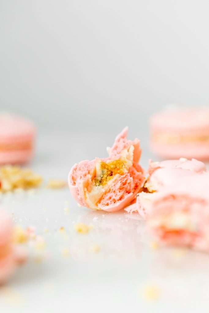 how to make birthday cake French macarons, filled with rainbow sprinkle frosting and rainbow cake crumbs. Dairy free & gluten free