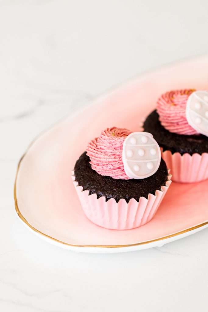 pop it themed chocolate raspberry cupcakes