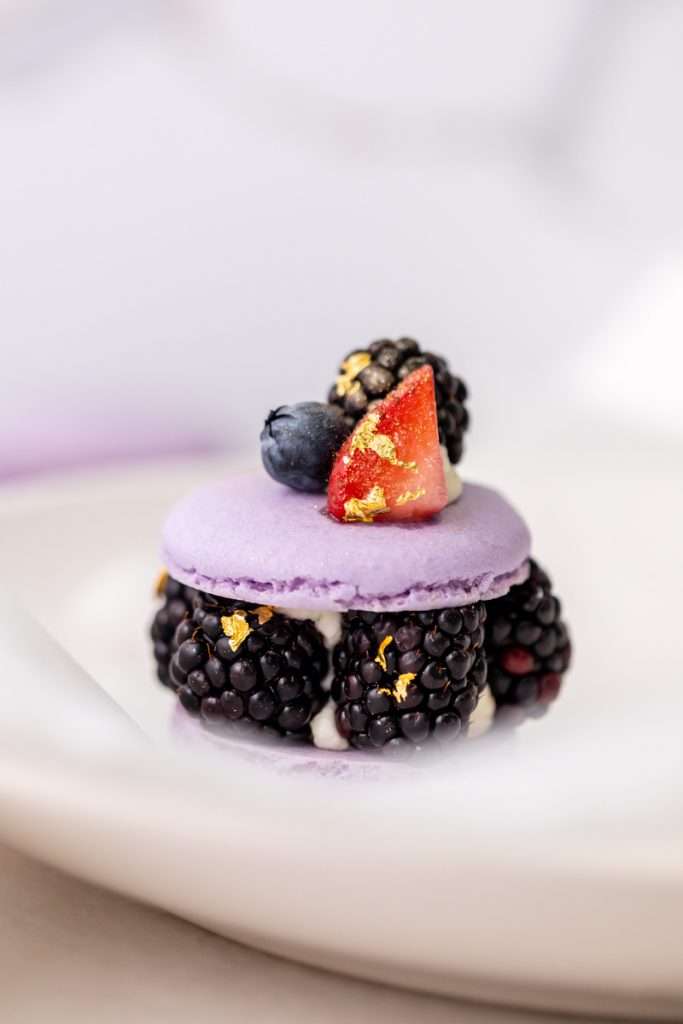 Laduree inspired summer French macarons filled with fresh blackberries and blueberries and lime filling. A dairy and gluten free variation perfect for seasonal gatherings and dessert menus.