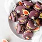Fresh fig and vanilla bean French macarons. A delicious flavor combination for the fall season! Perfect for autumn celebrations and gatherings. Recipe and assembly video.