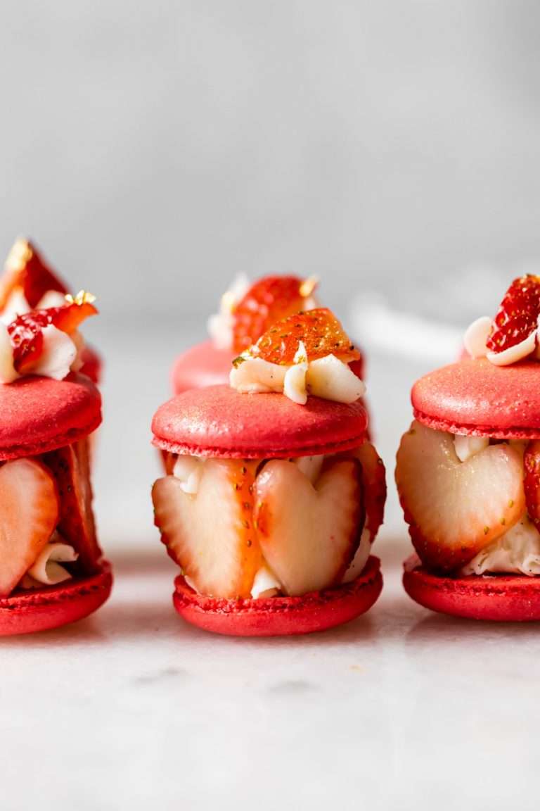 How to make Fresh strawberry macarons for Valentine's Day. Made with strawberry heart cutouts and vanilla bean filling. Dairy free and Gluten Free