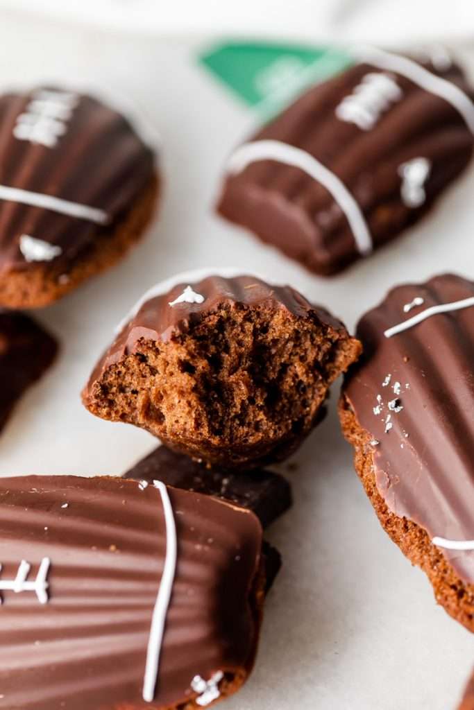 A recipe for chocolate French madeleines, coated in dark chocolate and decorated to look like footballs for Super Bowl Sunday or any football theme. Dairy and Gluten free option