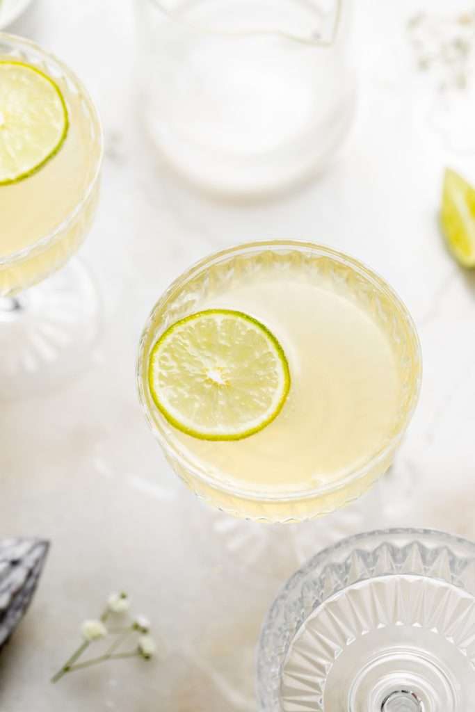 This Sparkling French Gimlet is a twist on the classic Gimlet cocktail, mixed with gin, lime juice, elderflower liqueur and champagne. The recipe is ready in under 5 minutes and the drink is perfect for the spring season and entertaining!