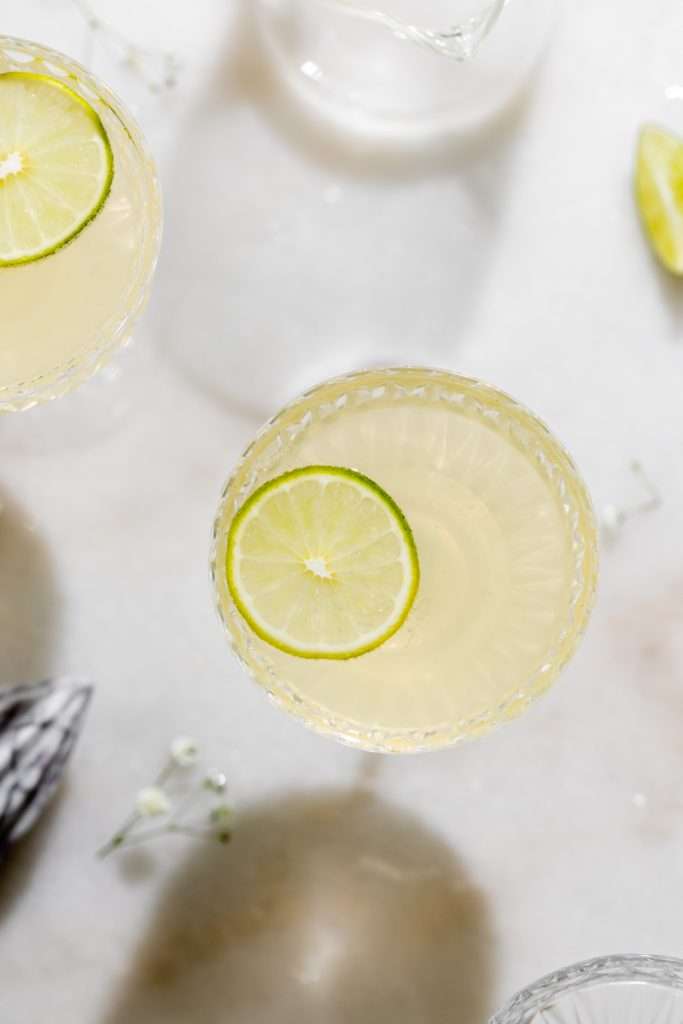 This Sparkling French Gimlet is a twist on the classic Gimlet cocktail, mixed with gin, lime juice, elderflower liqueur and champagne. The recipe is ready in under 5 minutes and the drink is perfect for the spring season and entertaining!