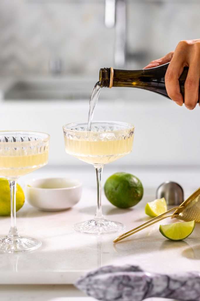 This Sparkling French Gimlet is a twist on the classic Gimlet cocktail, mixed with gin, lime juice, elderflower liqueur and champagne. The recipe is ready in under 5 minutes and the drink is perfect for the spring season and entertaining!