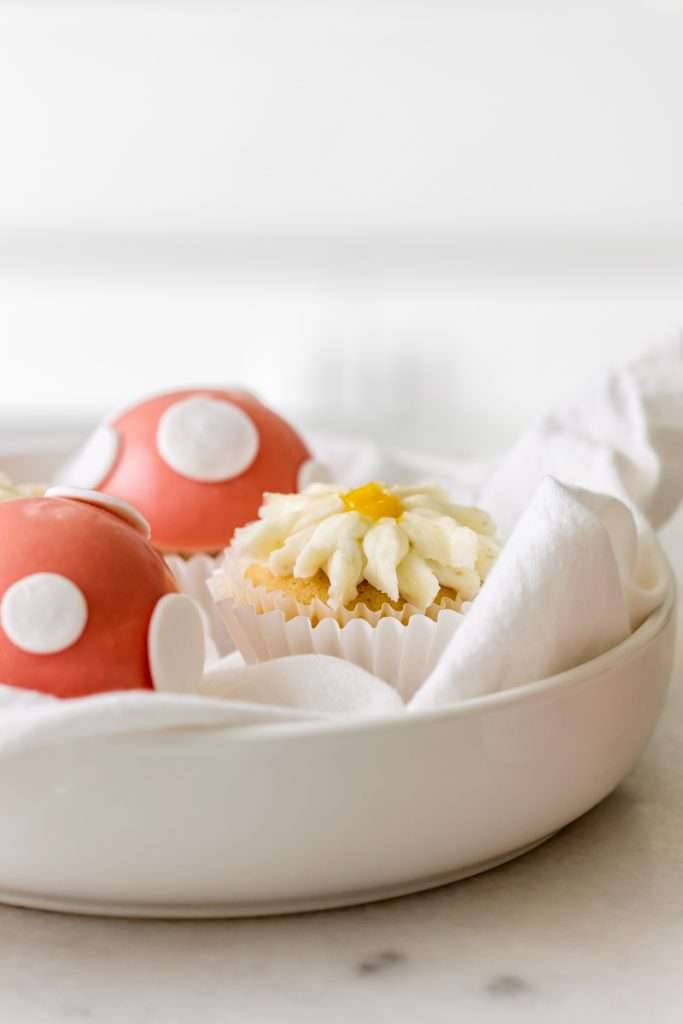An easy tutorial and recipe for mushroom cap and daisy decorated cupcakes, perfect for kids party themes and seasonal celebrations. Dairy Free