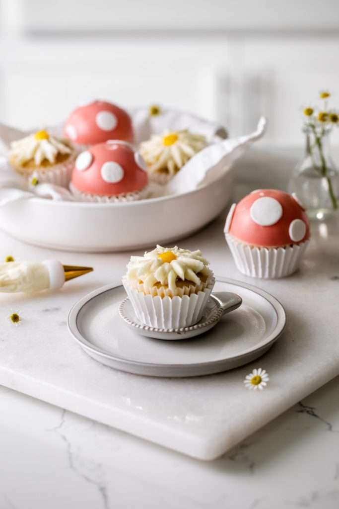 An easy tutorial and recipe for mushroom cap and daisy decorated cupcakes, perfect for kids party themes and seasonal celebrations. Dairy Free