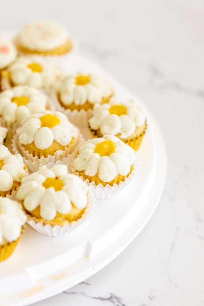 Kids retro themed birthday party with daisies, mushrooms, smiley face decor and a variety of desserts!