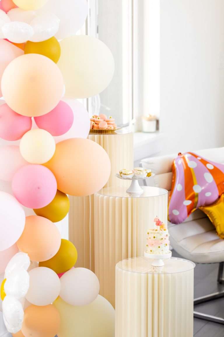 Kids retro themed birthday party with daisies, mushrooms, smiley face decor and a variety of desserts!