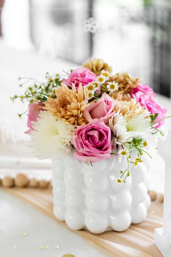 Flowers for kids retro themed birthday party with roses, mums and chamomile.