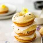 Light and fluffy small batch cake donuts covered in passionfruit glaze. Dairy free and baked not fried.