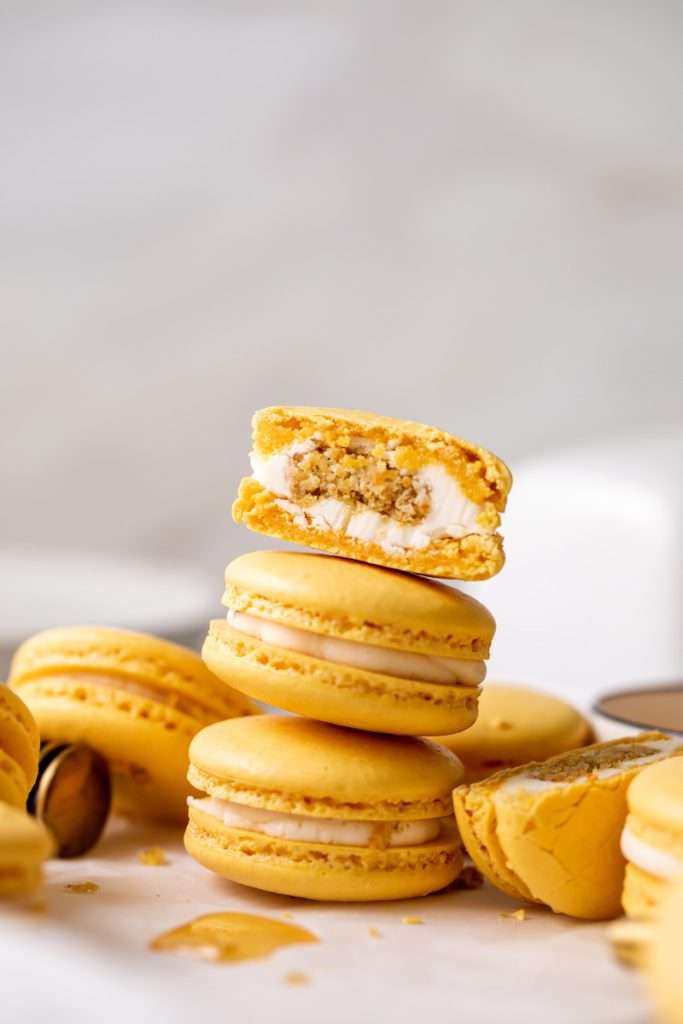Southern inspired honey cornbread macarons, filled with honey sweetened frosting and a savory cornbread center, for Juneteenth!