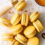 Southern inspired honey cornbread macarons, filled with honey sweetened frosting and a savory cornbread center, for Juneteenth!