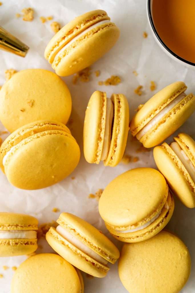Southern inspired honey cornbread macarons, filled with honey sweetened frosting and a savory cornbread center, for Juneteenth!