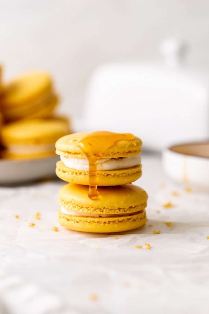 Southern inspired honey cornbread macarons, filled with honey sweetened frosting and a savory cornbread center, for Juneteenth!