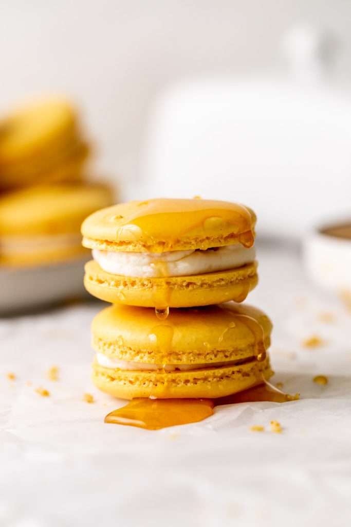 Southern inspired honey cornbread macarons, filled with honey sweetened frosting and a savory cornbread center, for Juneteenth!
