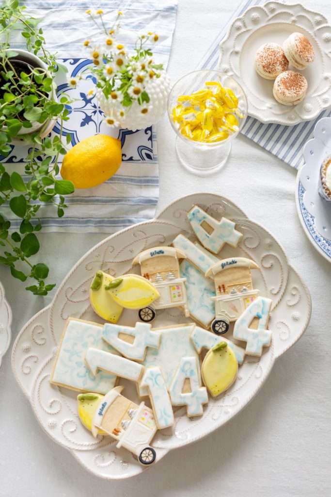Amalfi Coast themed birthday dinner party complete with lemon sugar cookies decorated with royal icing.