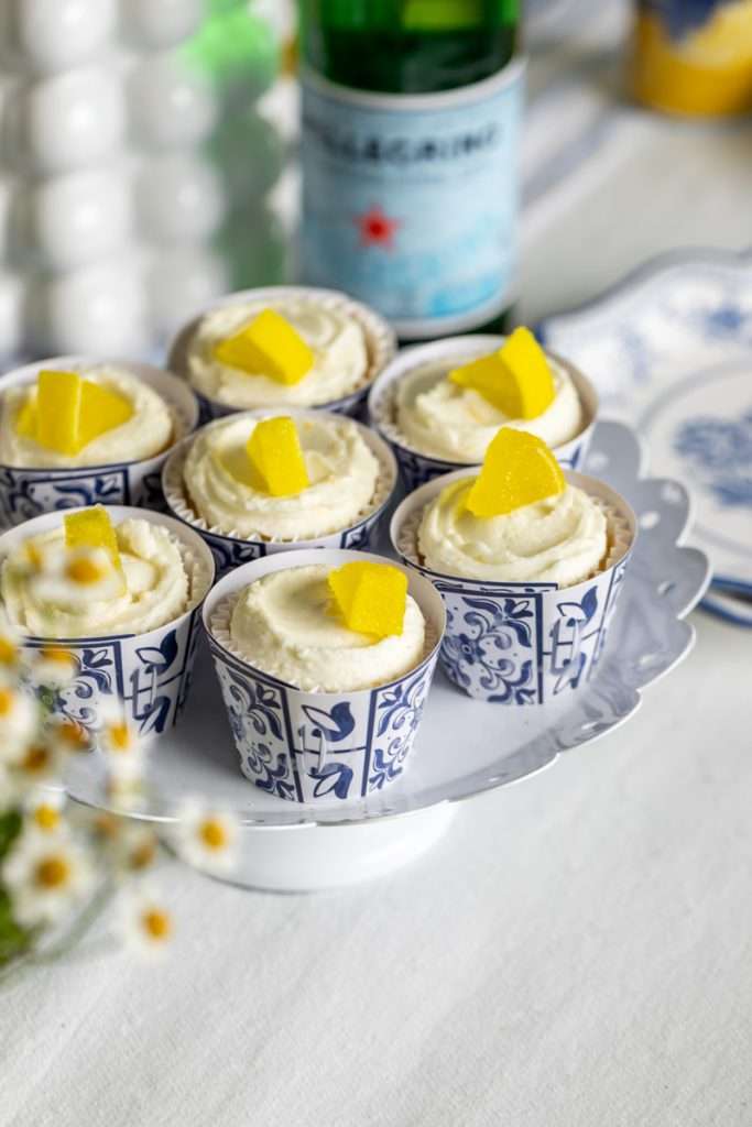 Amalfi Coast themed birthday dinner party complete with lemon basil cupcakes, filled with lemon basil curd. Topped with lemon candy.