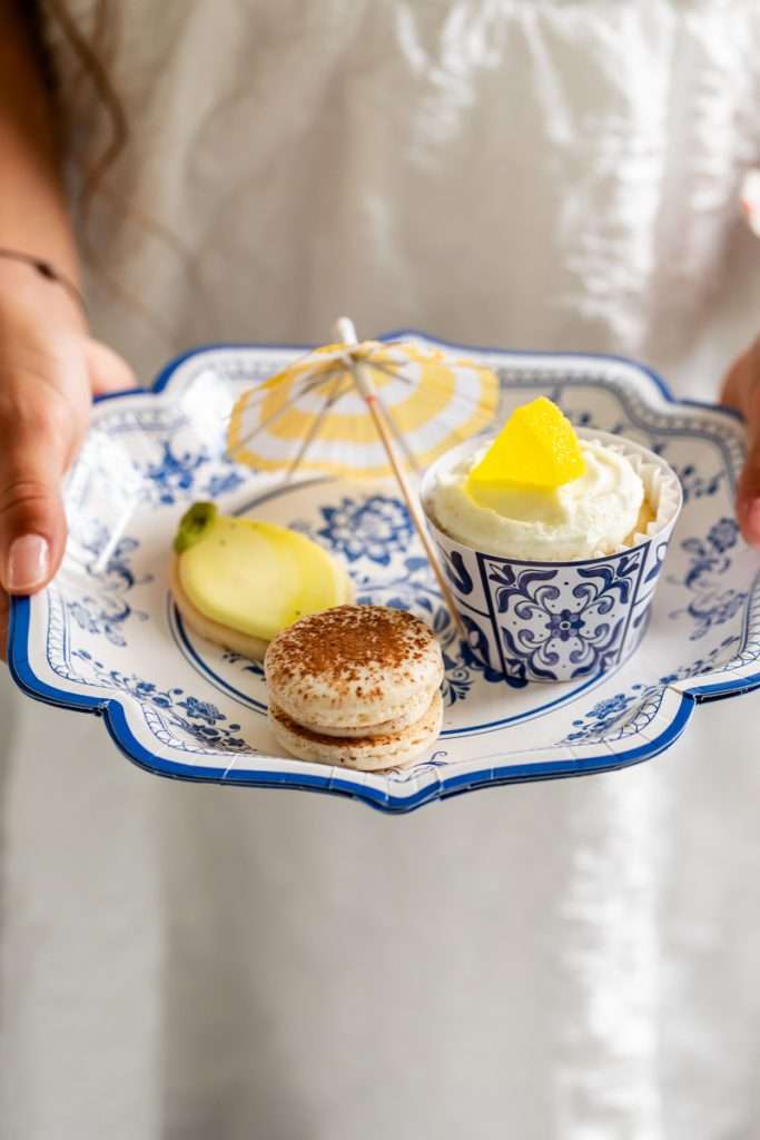 Amalfi Coast themed birthday dinner party complete with a variety of Italian Inspired desserts. From Lemon sugar cookies and cupcakes to tiramisu macarons.