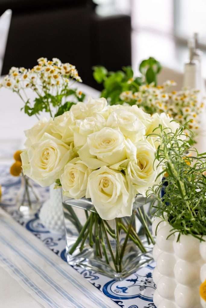 Amalfi Coast themed birthday dinner party flower arrangements and decor.