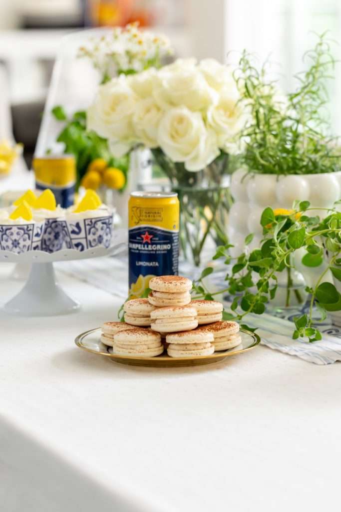 Amalfi Coast themed birthday dinner party complete with Tiramisu Macarons, inspired by the classic Italian coffee dessert.