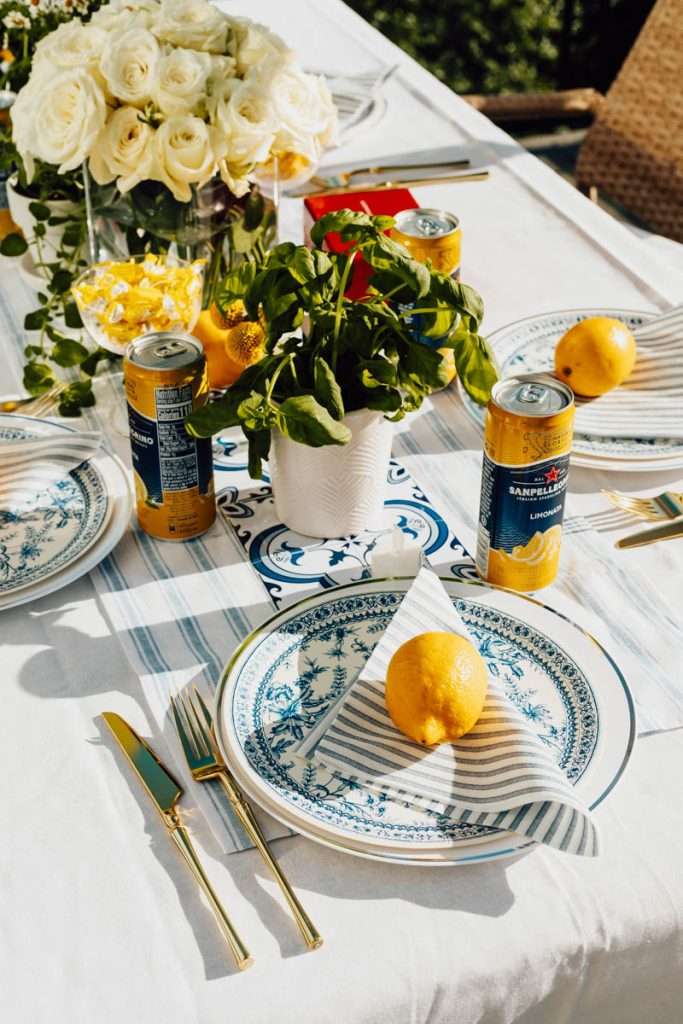 Amalfi Coast themed birthday dinner party complete with Italian inspired decor, table settings and desserts! A trendy party theme for teens.