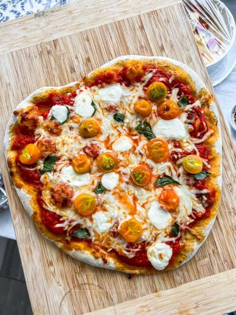 Grilled Margherita pizza for Amalfi Coast themed dinner party.