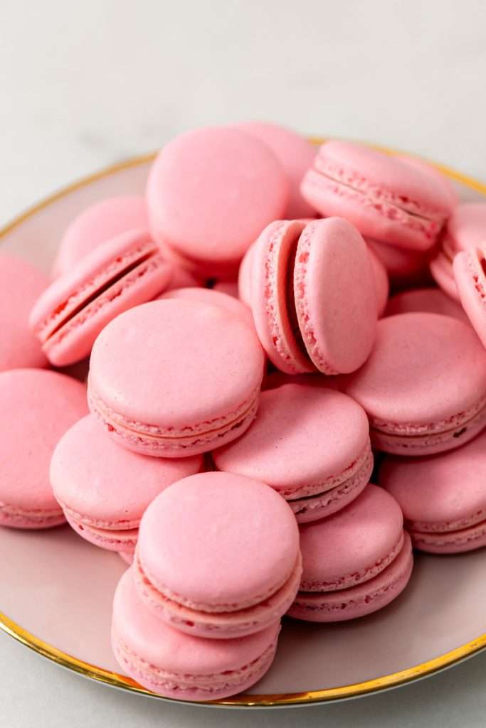 How to make a 3 tier macaron cube cake with a step by step recipe, instructions and a video included! These trendy macaron cube cakes are not only beautiful but perfect for gatherings and celebrations and much easier to assemble than they might look!