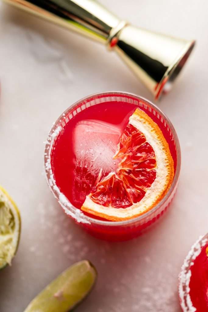 These blood orange margaritas are a vibrant and refreshing seasonal twist on the classic margarita, complete with fresh blood orange juice and only 5 other ingredients. The perfect cocktail recipe as we transition from winter to spring!