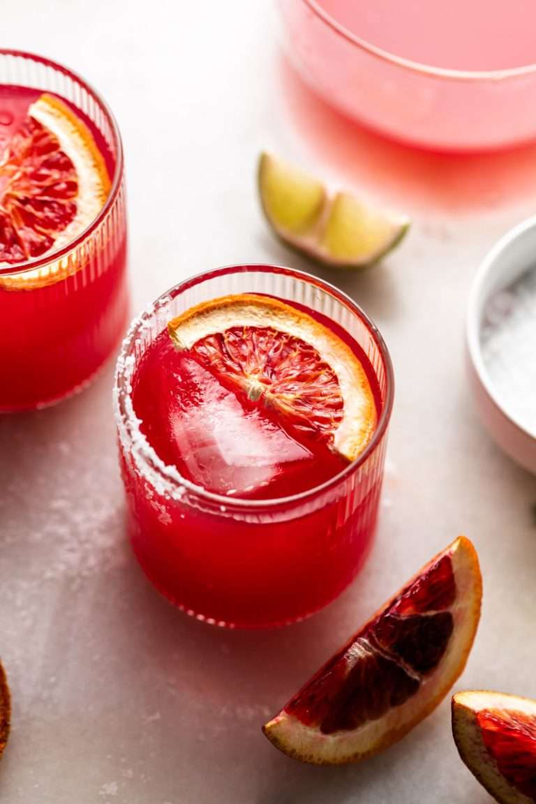 These blood orange margaritas are a vibrant and refreshing seasonal twist on the classic margarita, complete with fresh blood orange juice and only 5 other ingredients. The perfect cocktail recipe as we transition from winter to spring!