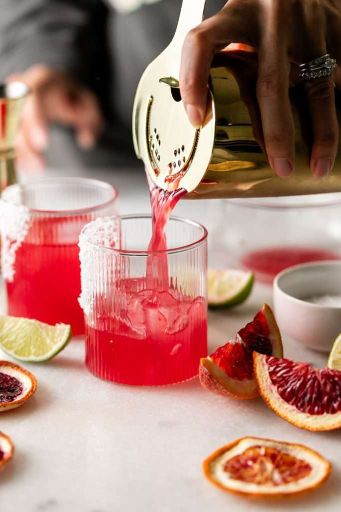 These blood orange margaritas are a vibrant and refreshing seasonal twist on the classic margarita, complete with fresh blood orange juice and only 5 other ingredients. The perfect cocktail recipe as we transition from winter to spring!