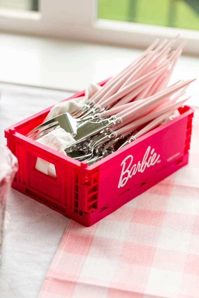 How to throw a Barbie Birthday Party, complete with pink Barbie decor, a life-size barbie box, custom barbie desserts, and details to highlight the iconic theme and movie. Links to all products shared in the post! 