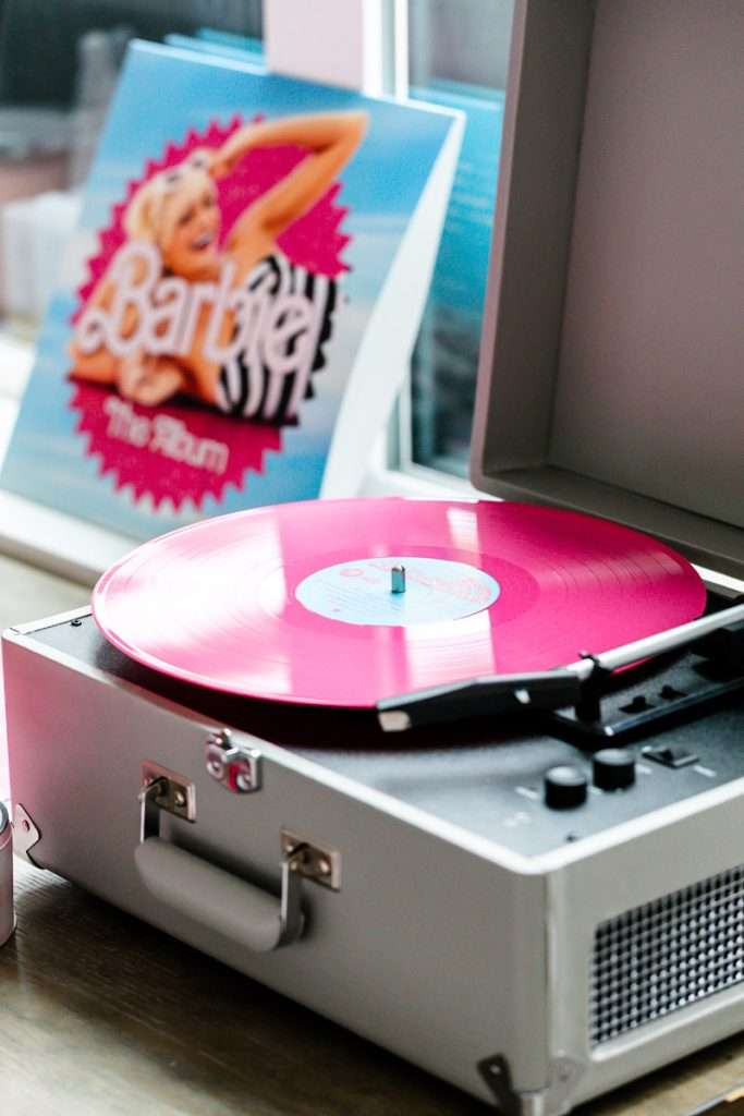 How to throw a Barbie Birthday Party, complete with pink Barbie decor, a life-size barbie box, custom barbie desserts, and details to highlight the iconic theme and movie. Links to all products shared in the post!