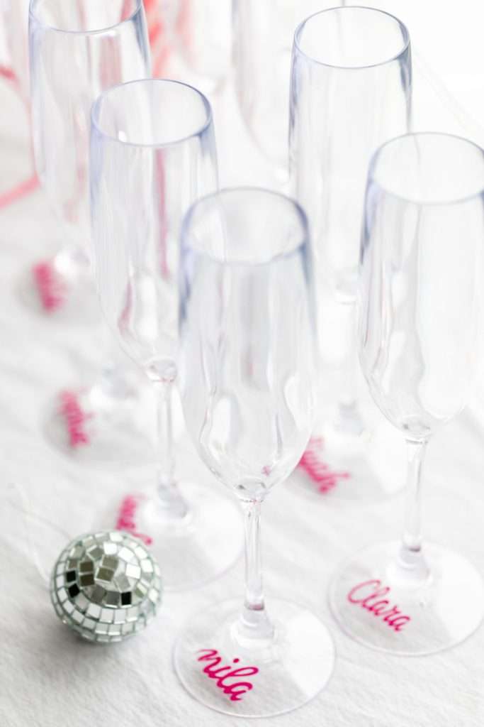 How to throw a Barbie Birthday Party, complete with pink Barbie decor, a life-size barbie box, custom barbie desserts, and details to highlight the iconic theme and movie. Links to all products shared in the post! 