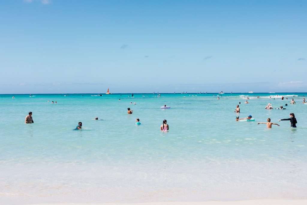 Traveling to Oahu and visiting Waikiki beach.