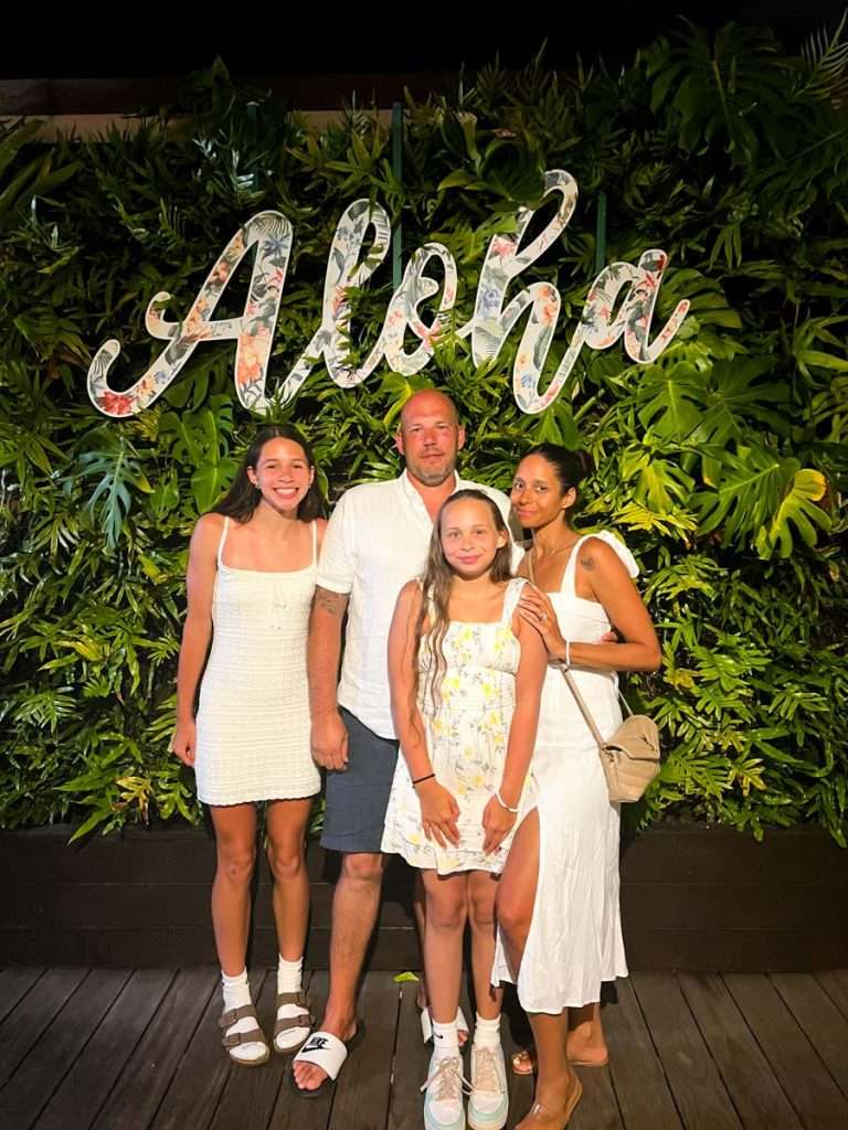 Family at Tommy Bahama Restaurant in Honolulu, Hawaii