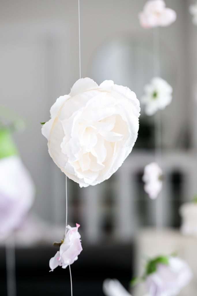 Floating flower decorations for flower themed party with fishing line and silk flowers