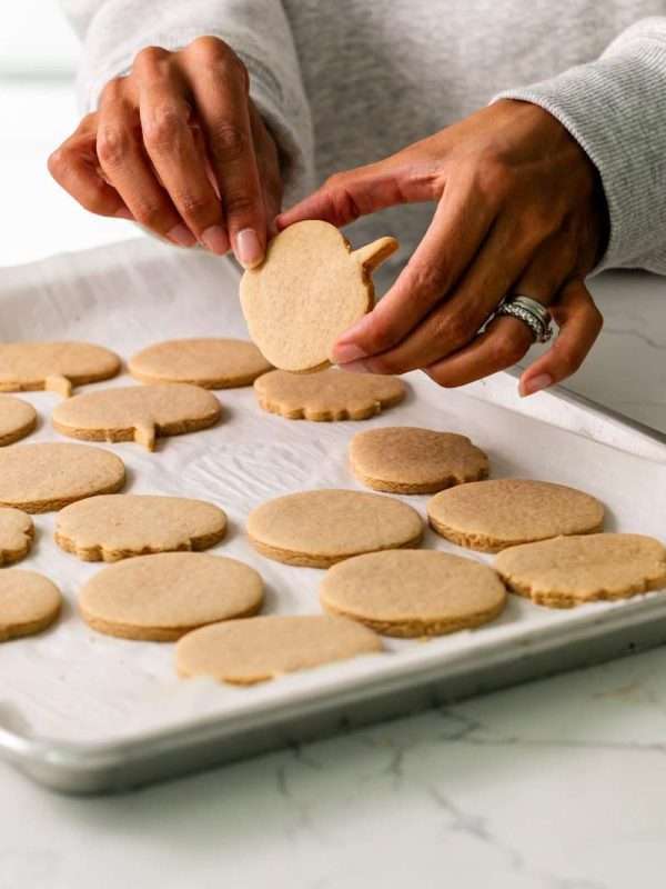 New downloadable recipe for Pumpkin Spice flavored sugar cookies, baked with pumpkin purée and pumpkin spice blend. They are cozy, flavorful and the perfect seasonal roll out cookie to decorate with your favorite royal icing or buttercream frosting. Dairy free option included!