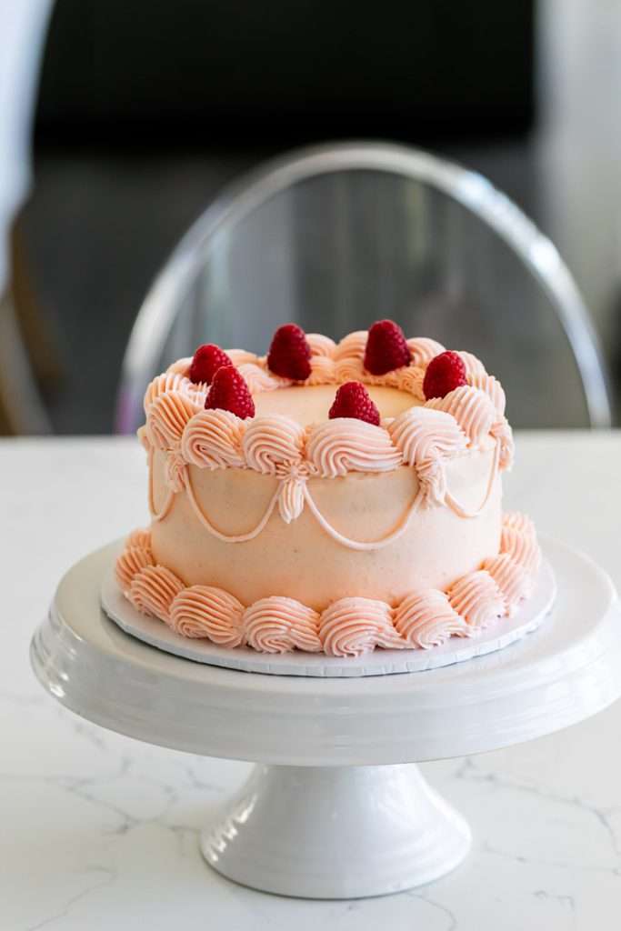 Cute 6" pink raspberry piped lambeth cake for sweet sixteen birthday party.