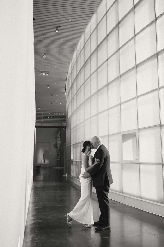 Couple celebrating their 20 year wedding anniversary at a black and white themed party